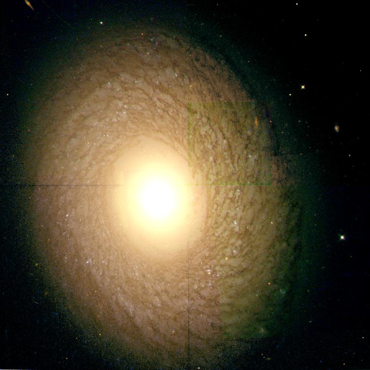 Космический телескоп  Хаббл  сделал завораживающий снимок далекой галактики NGC 2775, расположенной на расстоянии 67 миллионов световых лет от Земли